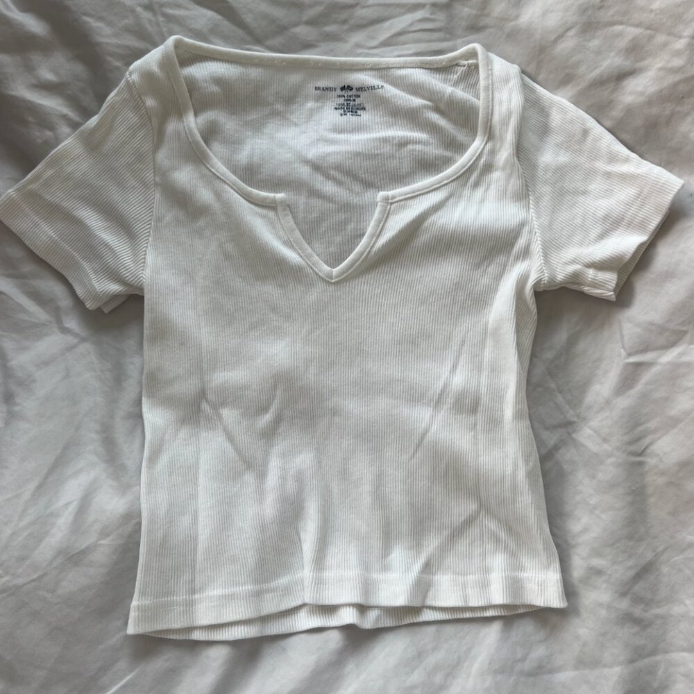 Brandy Melville white v-neck tee. Super cute and flattering.In perfect condition